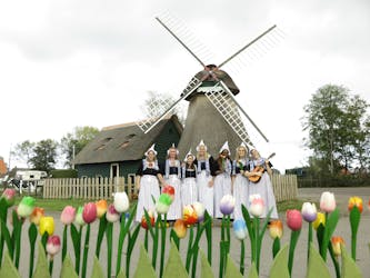 Picture in Volendam costume with cheese and clog tour